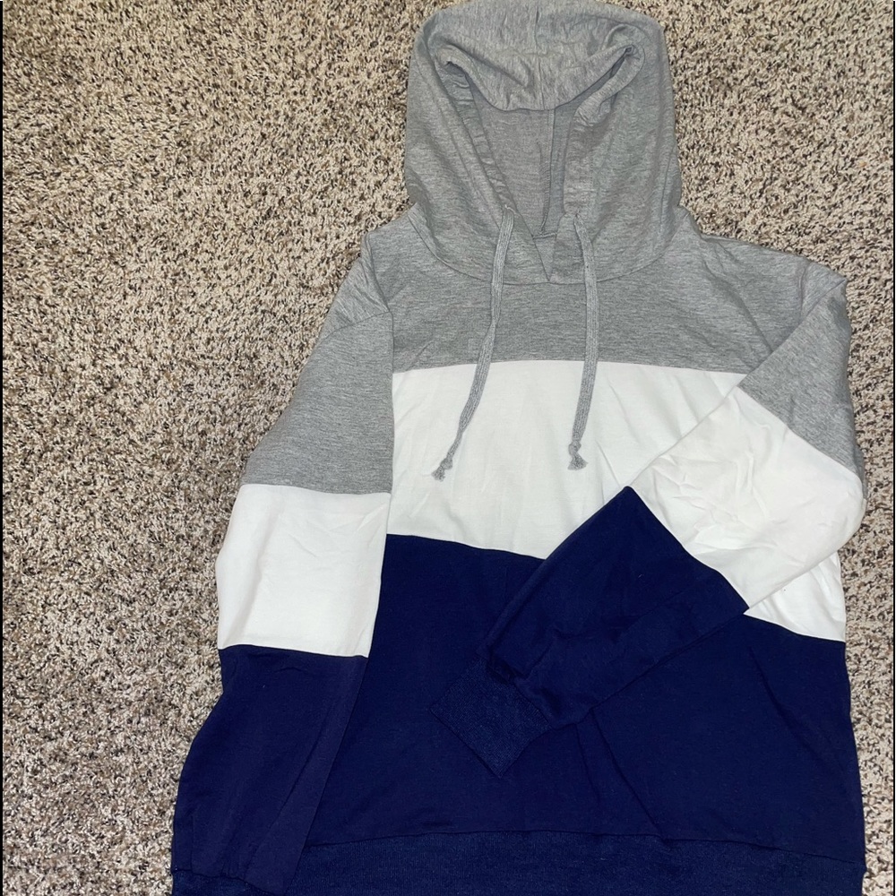 Blue, grey, and white hoodie from Amazon. Size L.